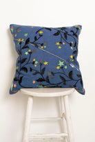 Pillow with embroidery embellishments, front view 