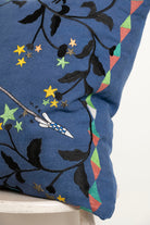 Pillow with embroidery embellishments, close up view 