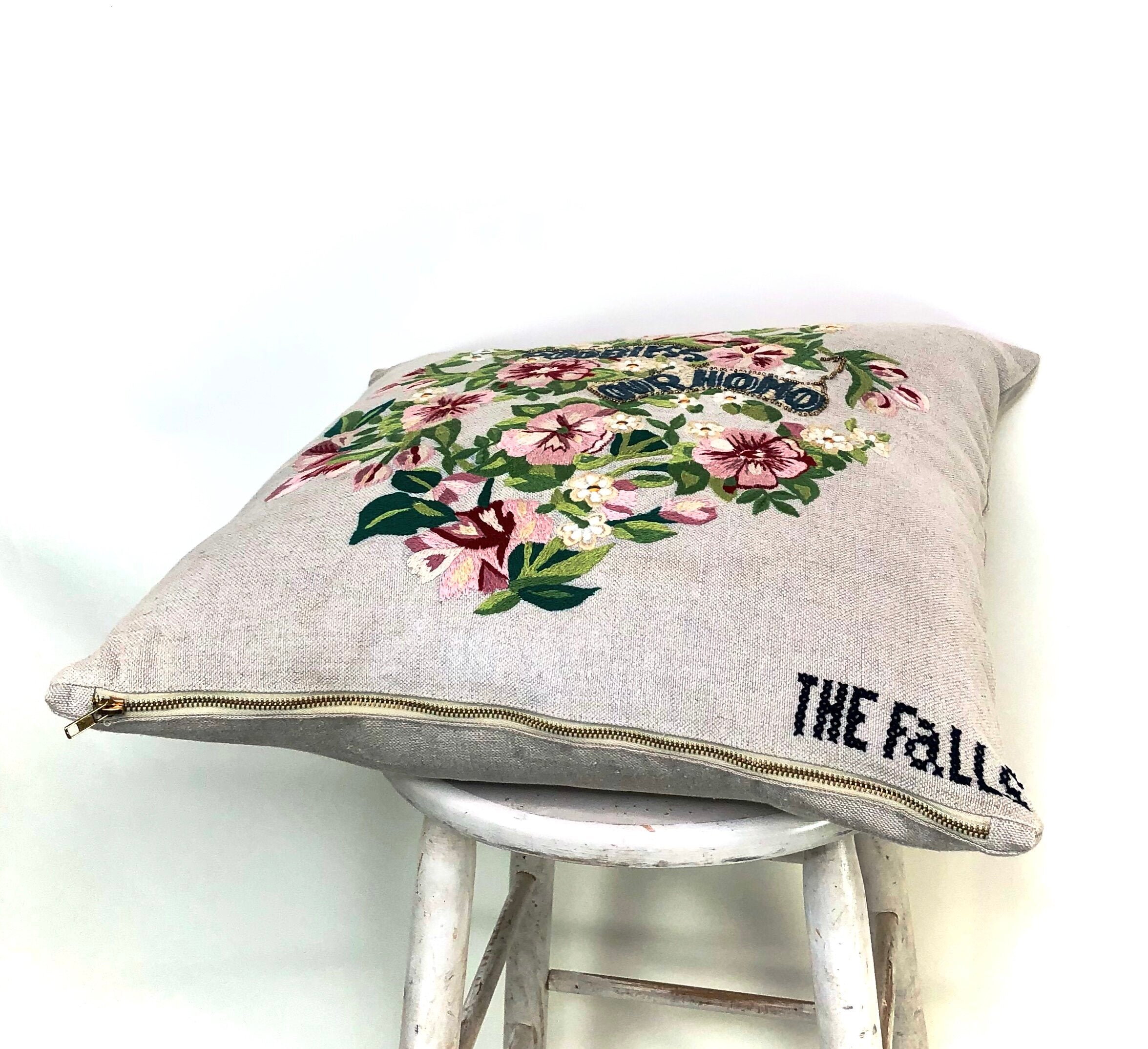 Pillow with embroidery embellishments, bottom view 