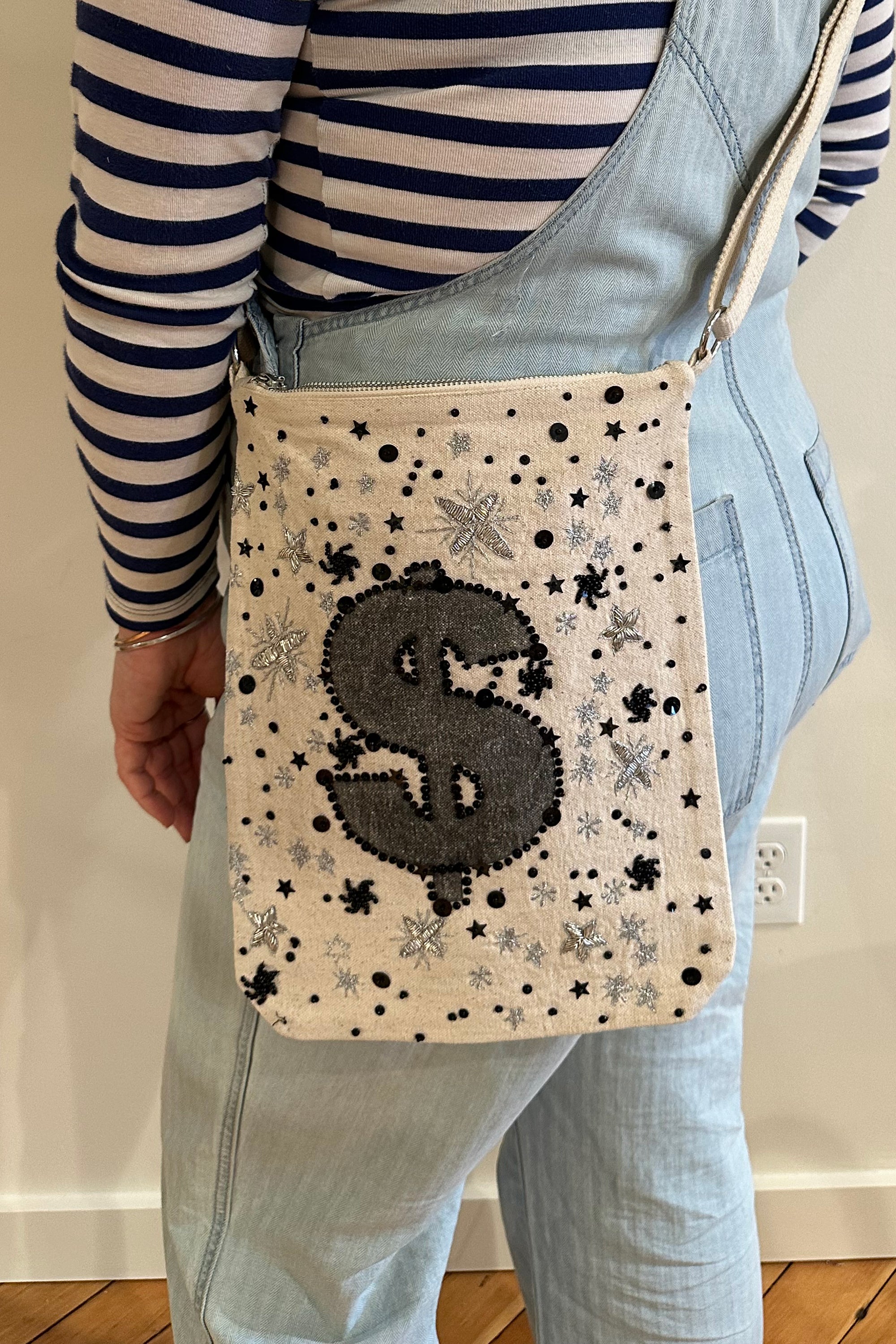 Embellished bag with money sign, front view 